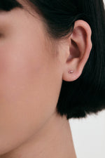 Interstellar 14K Solid Gold Pink Sapphire & Diamond Stud Earrings on model