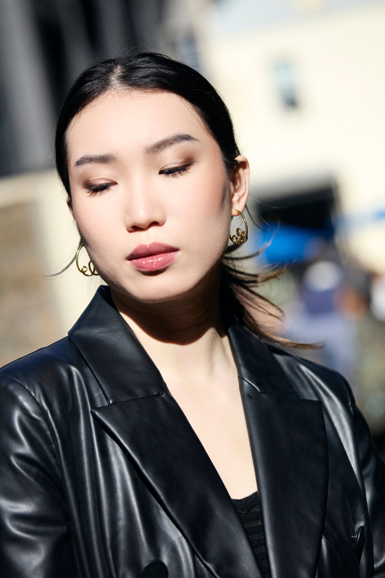 Sterling silver with gold plating Doodle Medium Hoop Earrings on model