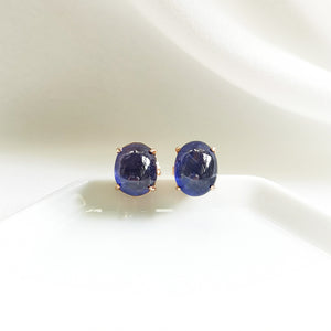 
                
                    Load image into Gallery viewer, Cleo Blue Sapphire Oval Cabochon Stud Earrings - 18K Rose Gold Plated
                
            