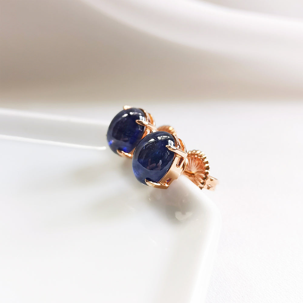 Cleo Blue Sapphire Oval Cabochon Stud Earrings - 18K Rose Gold Plated