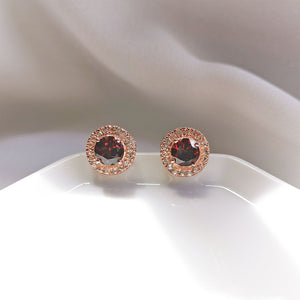 
                
                    Load image into Gallery viewer, Garnet Birthstone round halo white topaz stud earrings
                
            