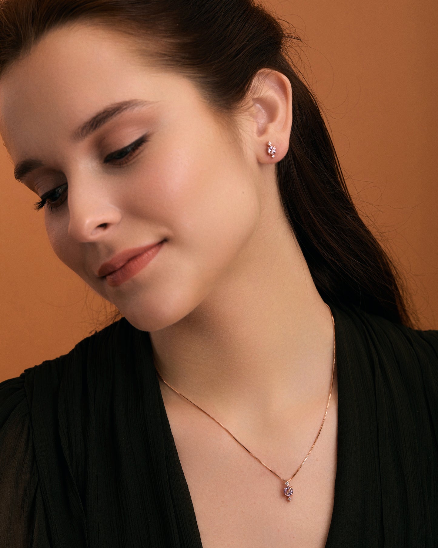 Pink Amethyst planet stud earrings on model