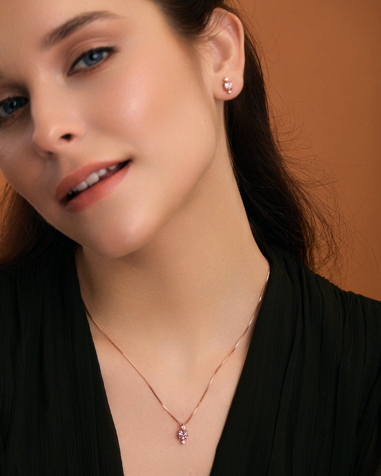 Pink amethyst planet necklace on model