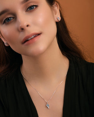 
                
                    Load image into Gallery viewer, Sky blue topaz &amp;amp; white topaz star necklace on model
                
            