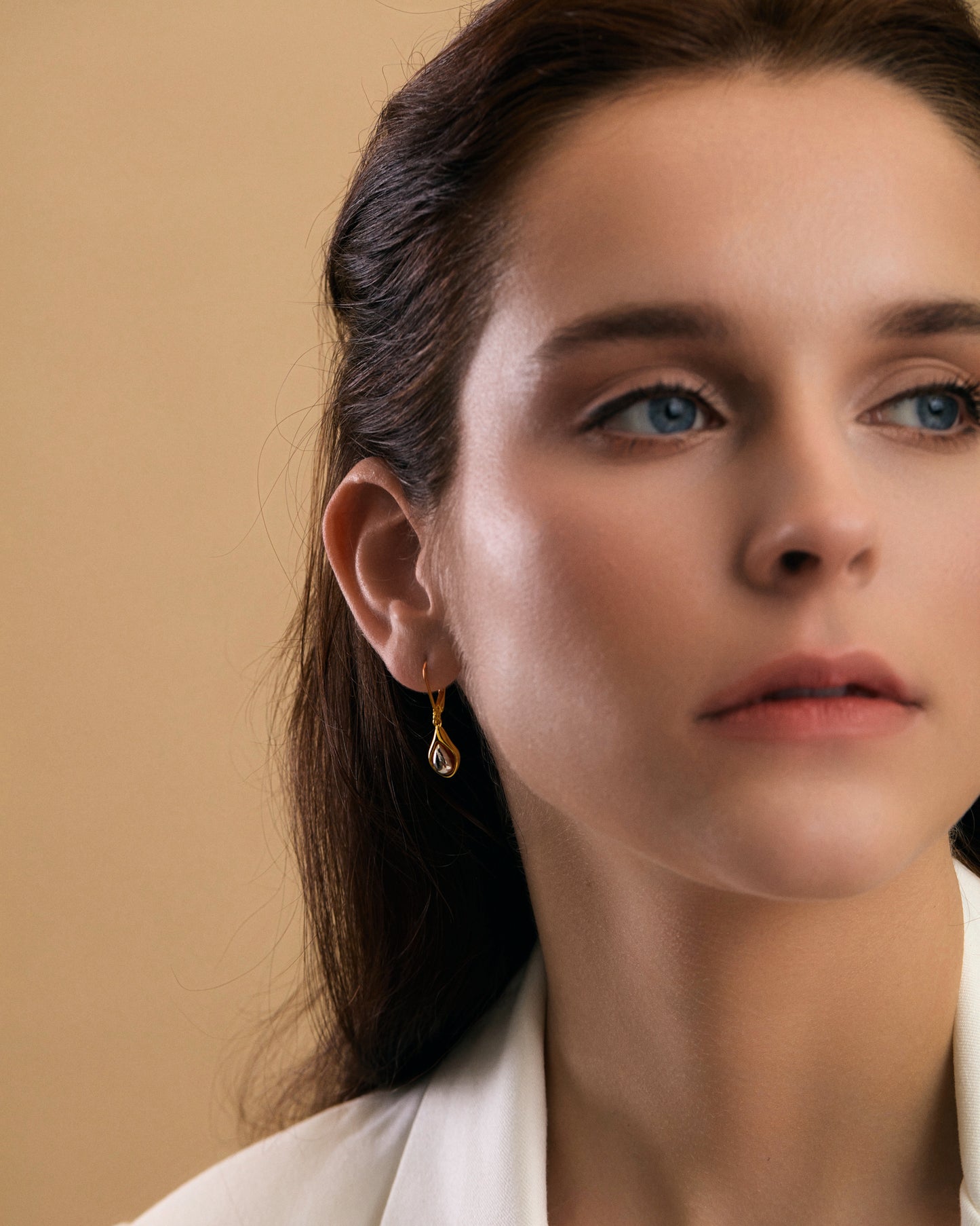 Seed Duo Tone Dangle Earrings on model