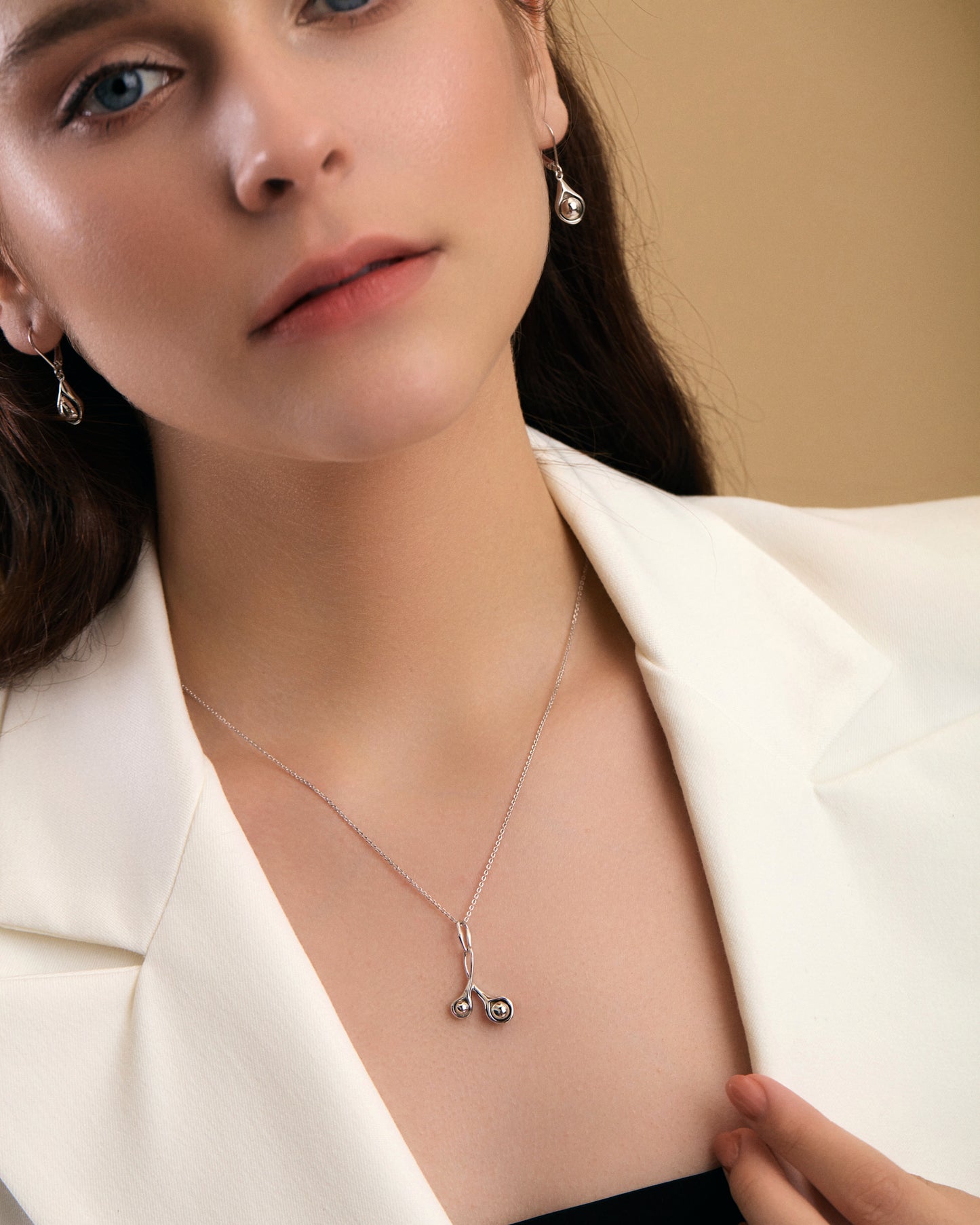 Seed sterling silver necklace on model