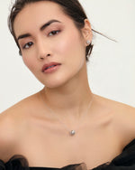 Dandelion motif ball sterling silver necklace on model 
