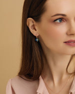 Malachite, Blue Agate & White Topaz Latch Back Rose Gold Dangle Earrings on model