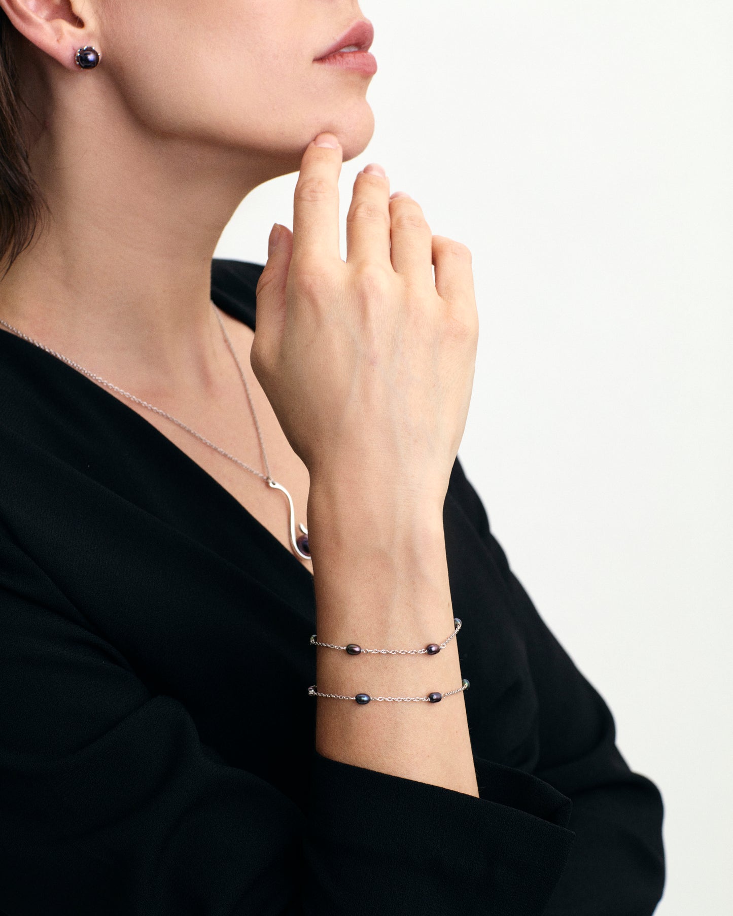 Black fresh water pearl sterling silver chain bracelet on model
