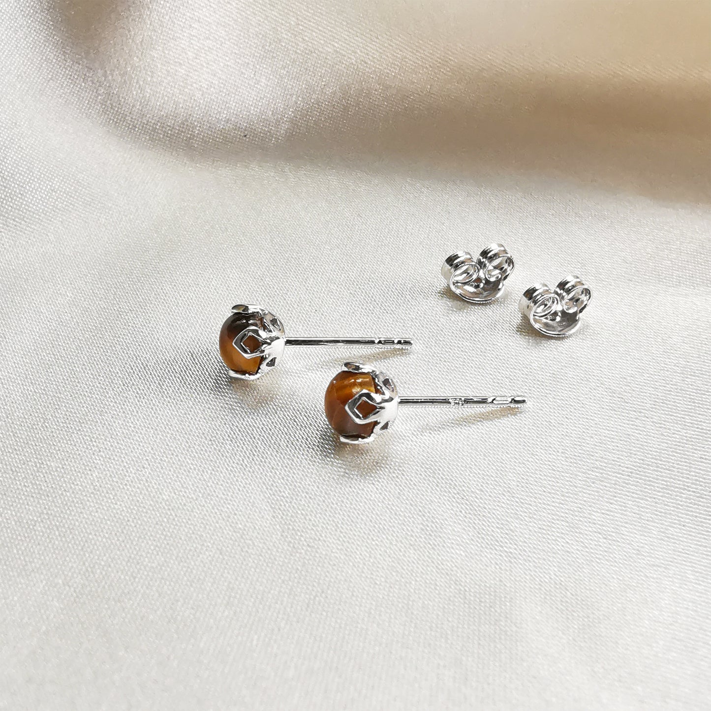 rhodium plated tiger's eye round stud earrings