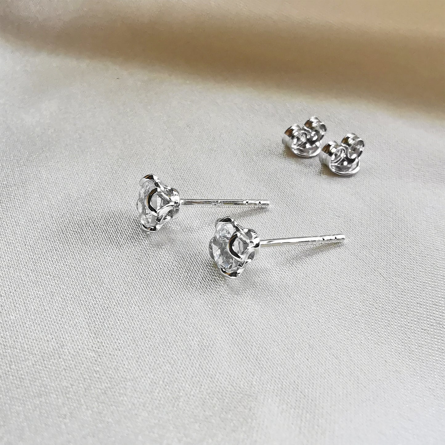rhodium plated white topaz round stud earrings