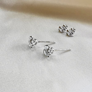 
                
                    Load image into Gallery viewer, rhodium plated white topaz round stud earrings
                
            